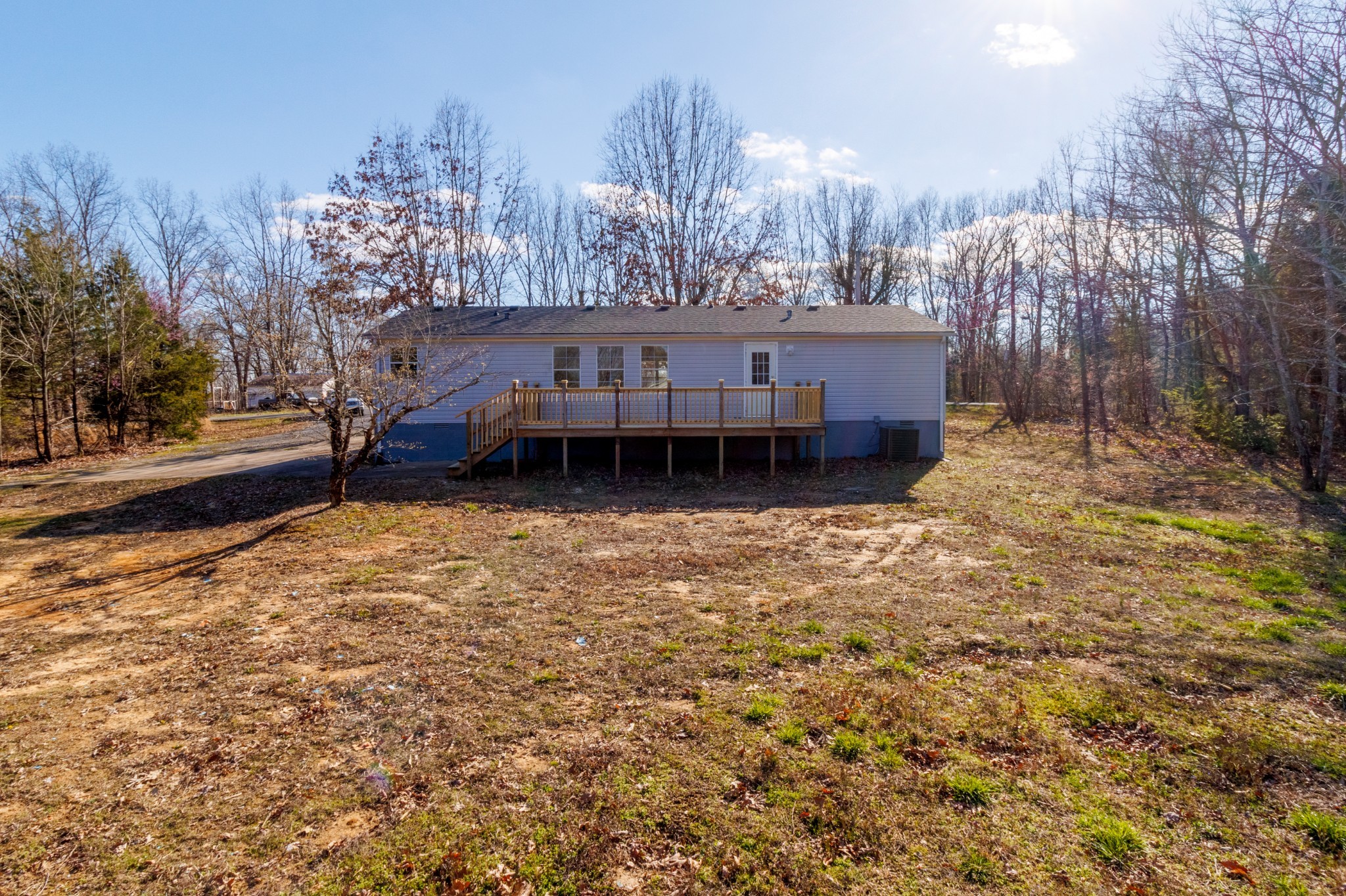 1835 Jim Kim Road Palmyra, TN 37142 - Photo 33 of 36 a house view with a backyard space
