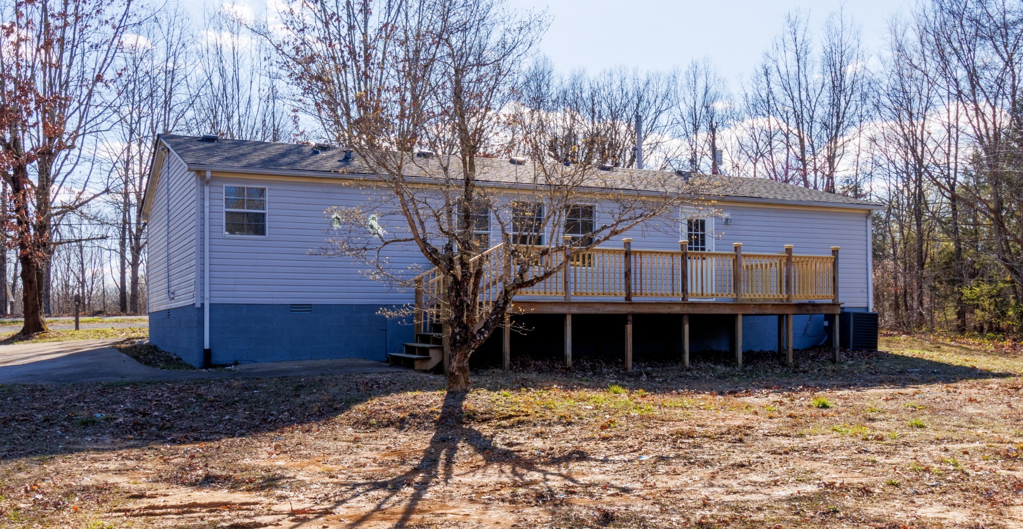 1835 Jim Kim Road Palmyra, TN 37142 - Photo 34 of 36 a front view of a house with a yard