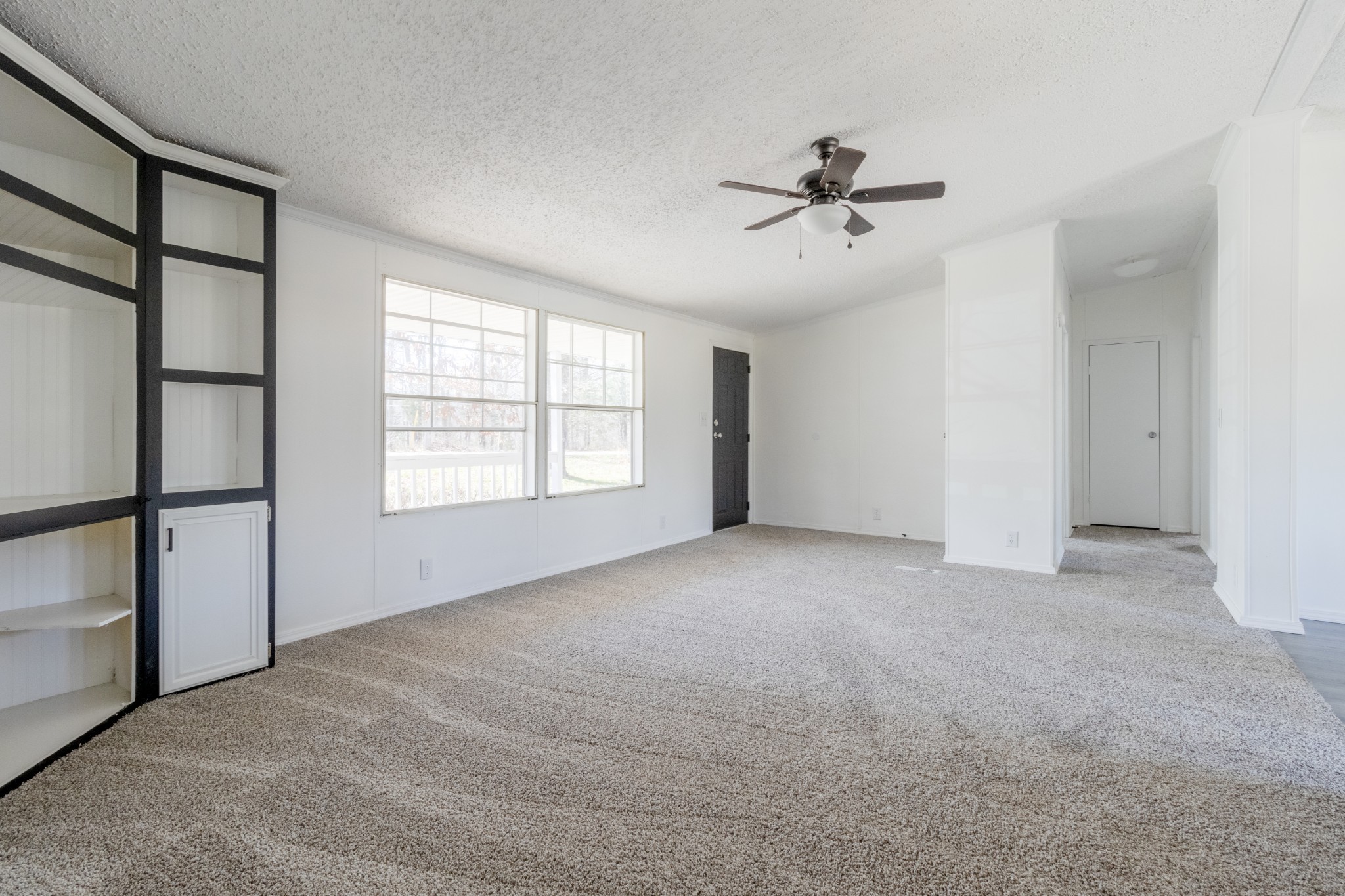 1835 Jim Kim Road Palmyra, TN 37142 - Photo 6 of 36 a view of an empty room with a window