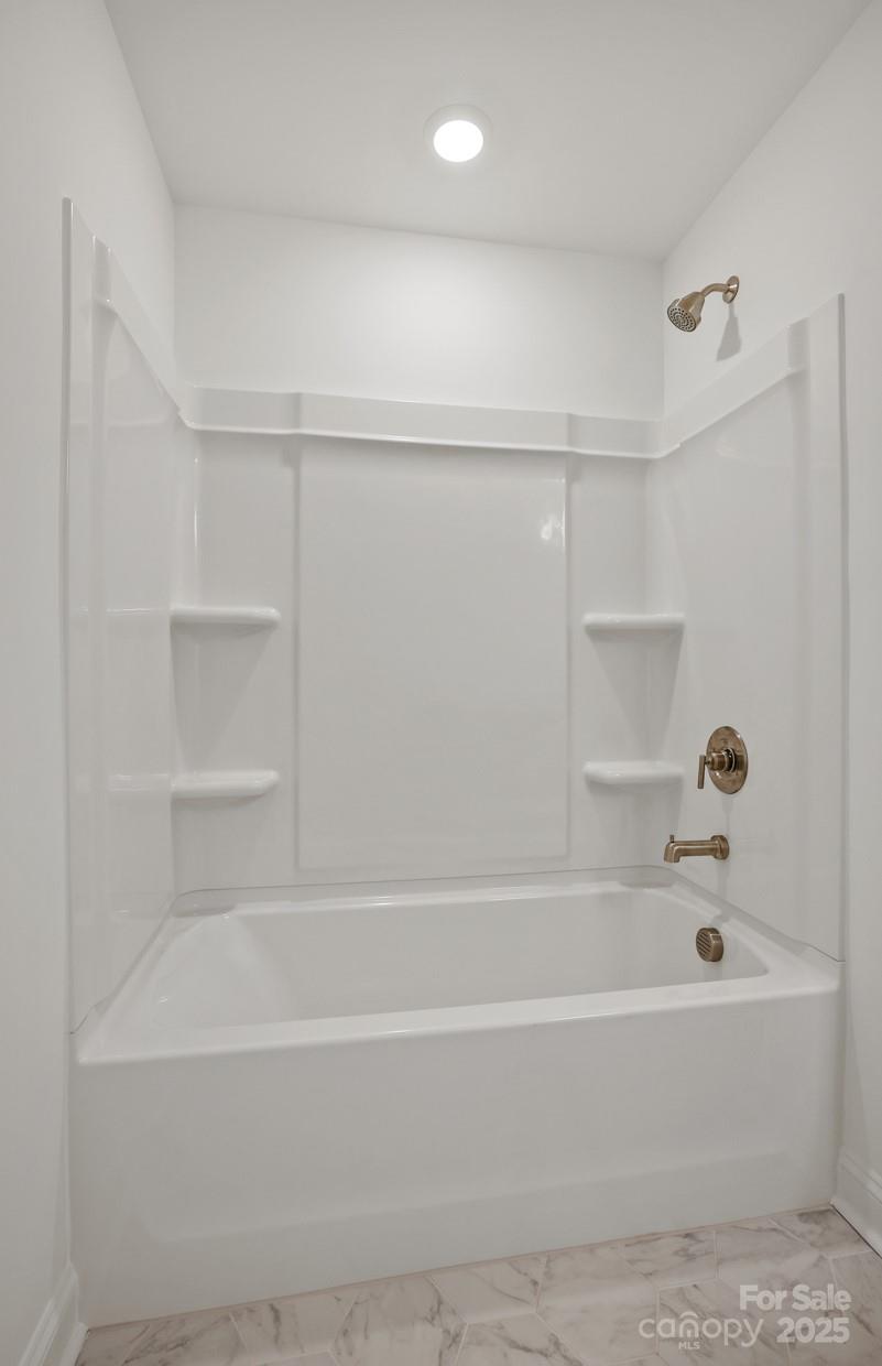 2234 Millenium Drive, Unit 84 Lancaster, SC 29720 - Photo 26 of 37 a bathroom with a bathtub