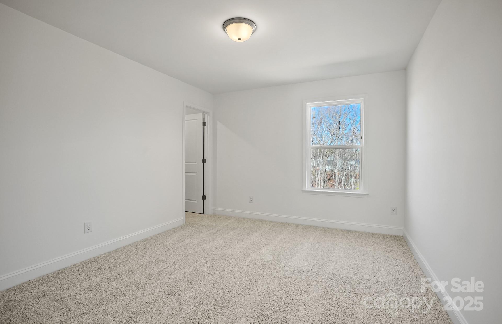 2234 Millenium Drive, Unit 84 Lancaster, SC 29720 - Photo 28 of 37 an empty room with a cabinet
