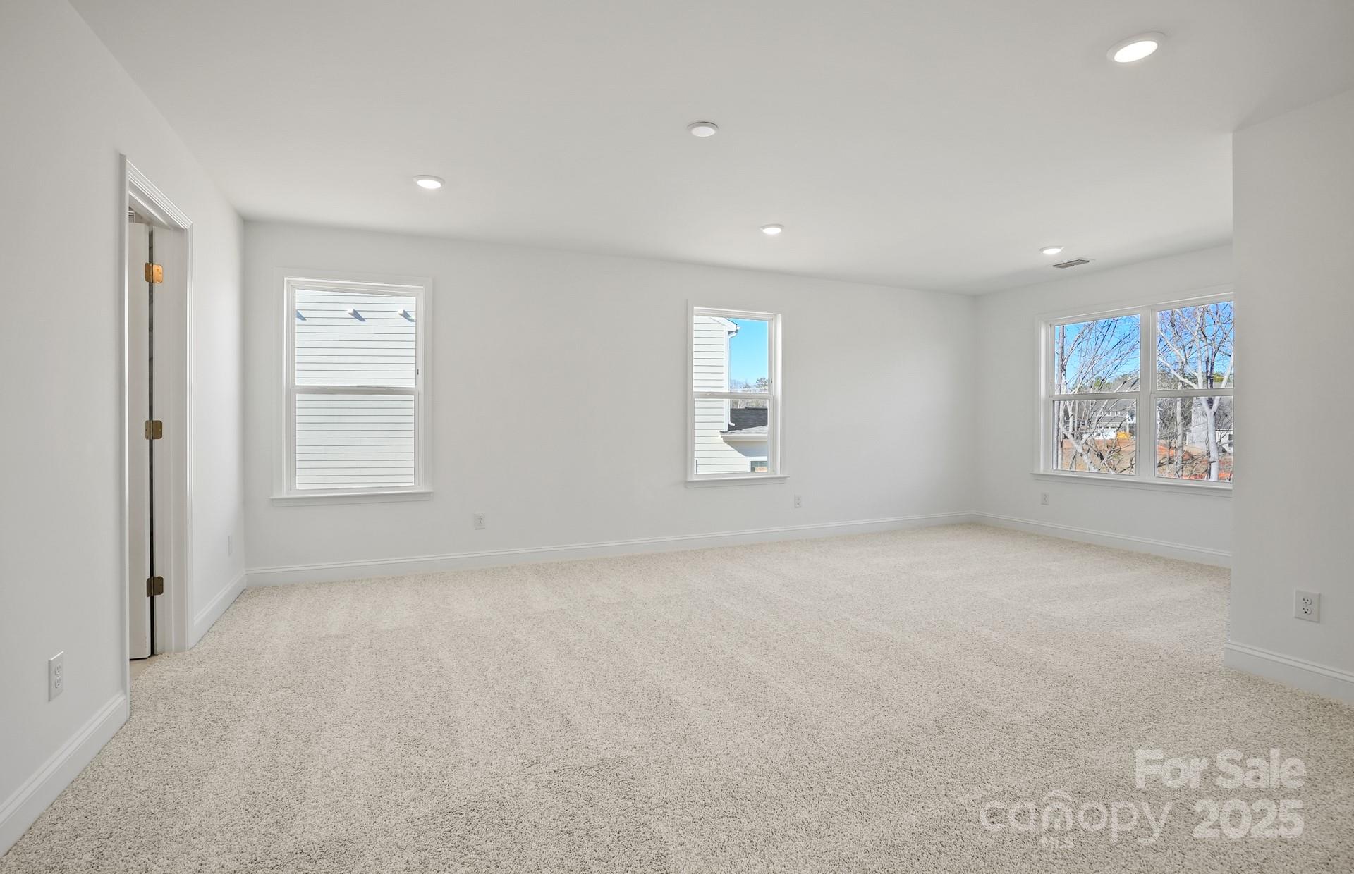 2234 Millenium Drive, Unit 84 Lancaster, SC 29720 - Photo 29 of 37 an empty room with windows and closet