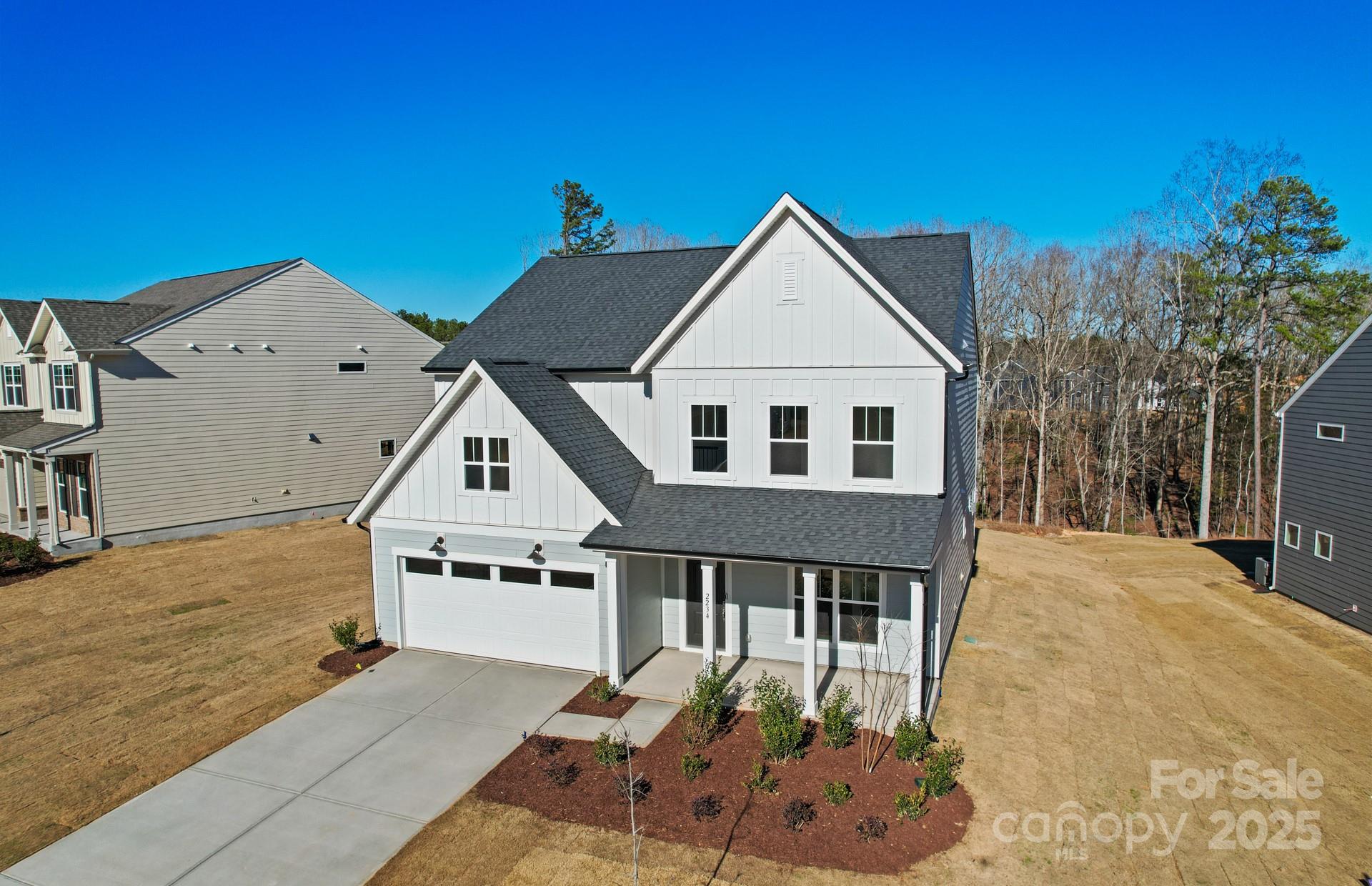 2234 Millenium Drive, Unit 84 Lancaster, SC 29720 - Photo 3 of 37 a view of a house with a yard