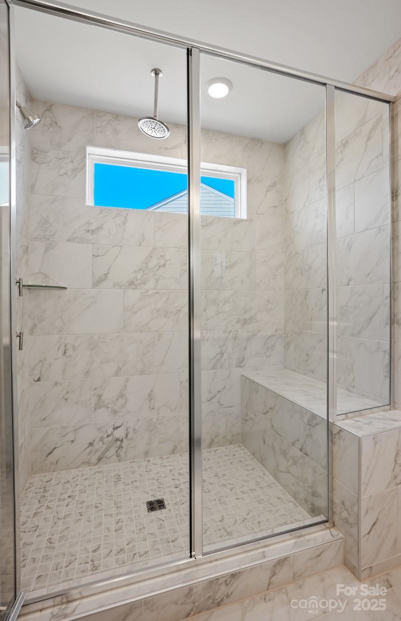 2234 Millenium Drive, Unit 84 Lancaster, SC 29720 - Photo 34 of 37 a bathroom with a shower and mirror