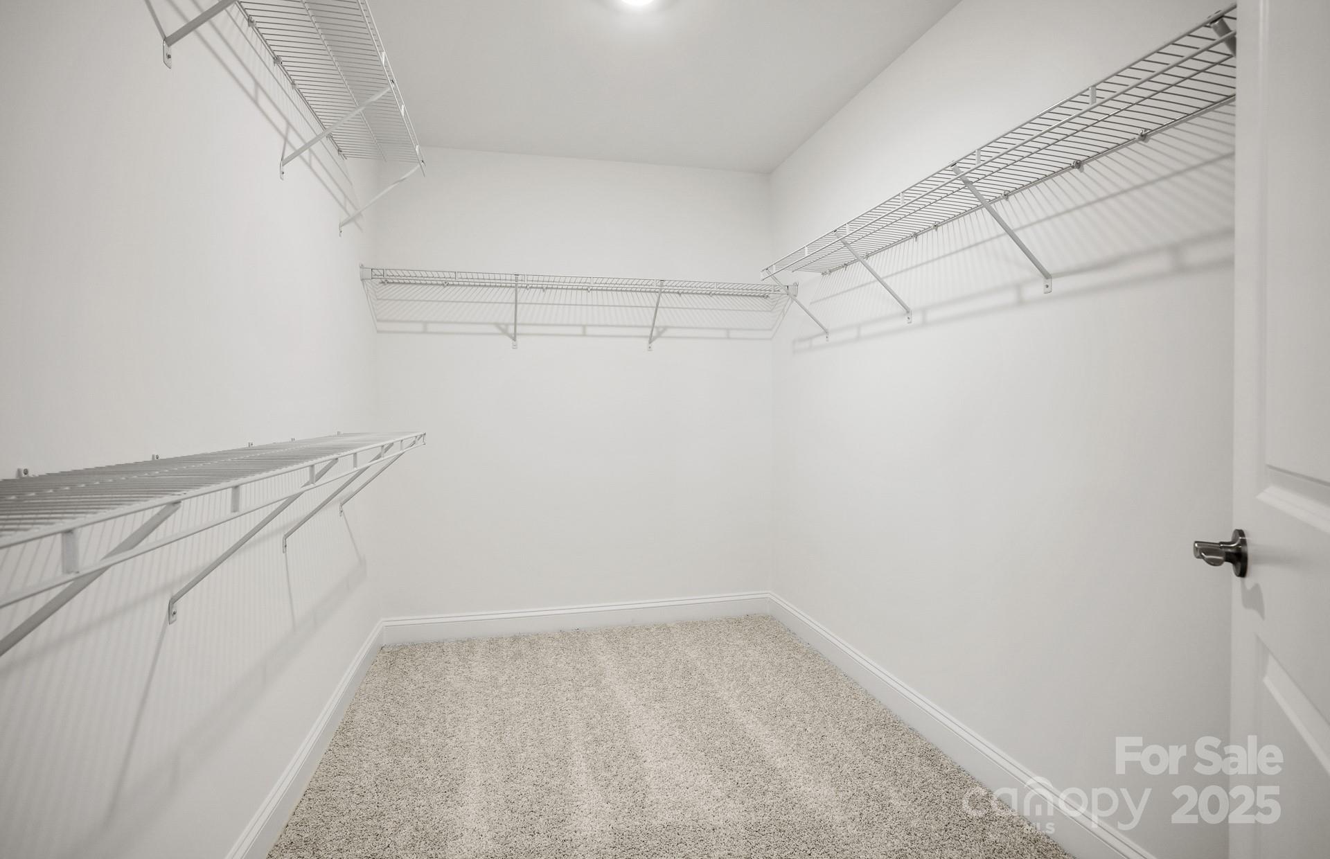 2234 Millenium Drive, Unit 84 Lancaster, SC 29720 - Photo 35 of 37 a view of a room with racks on the wall