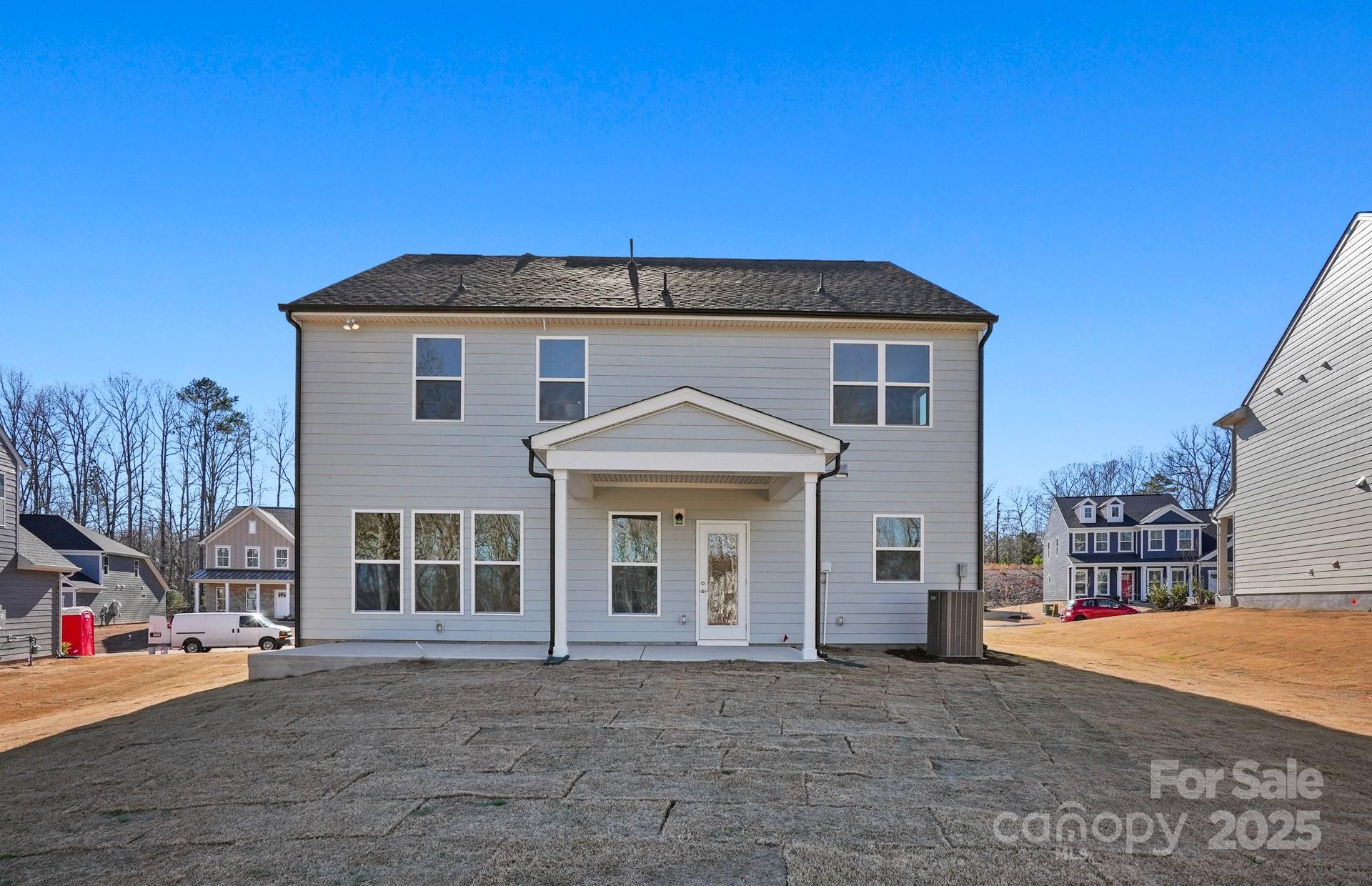 2234 Millenium Drive, Unit 84 Lancaster, SC 29720 - Photo 36 of 37 a front view of a house with a yard