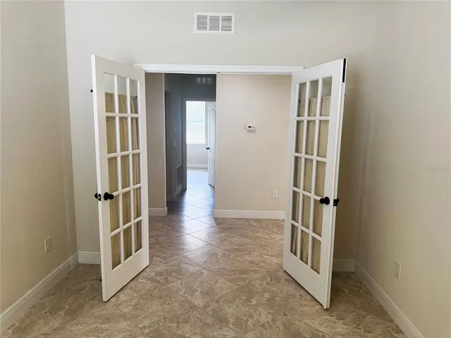 an entryway with a workspace