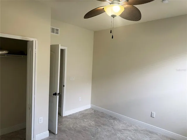 an empty room with a bathroom