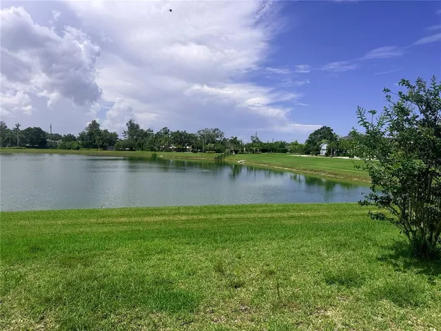 a view of a lake with a city