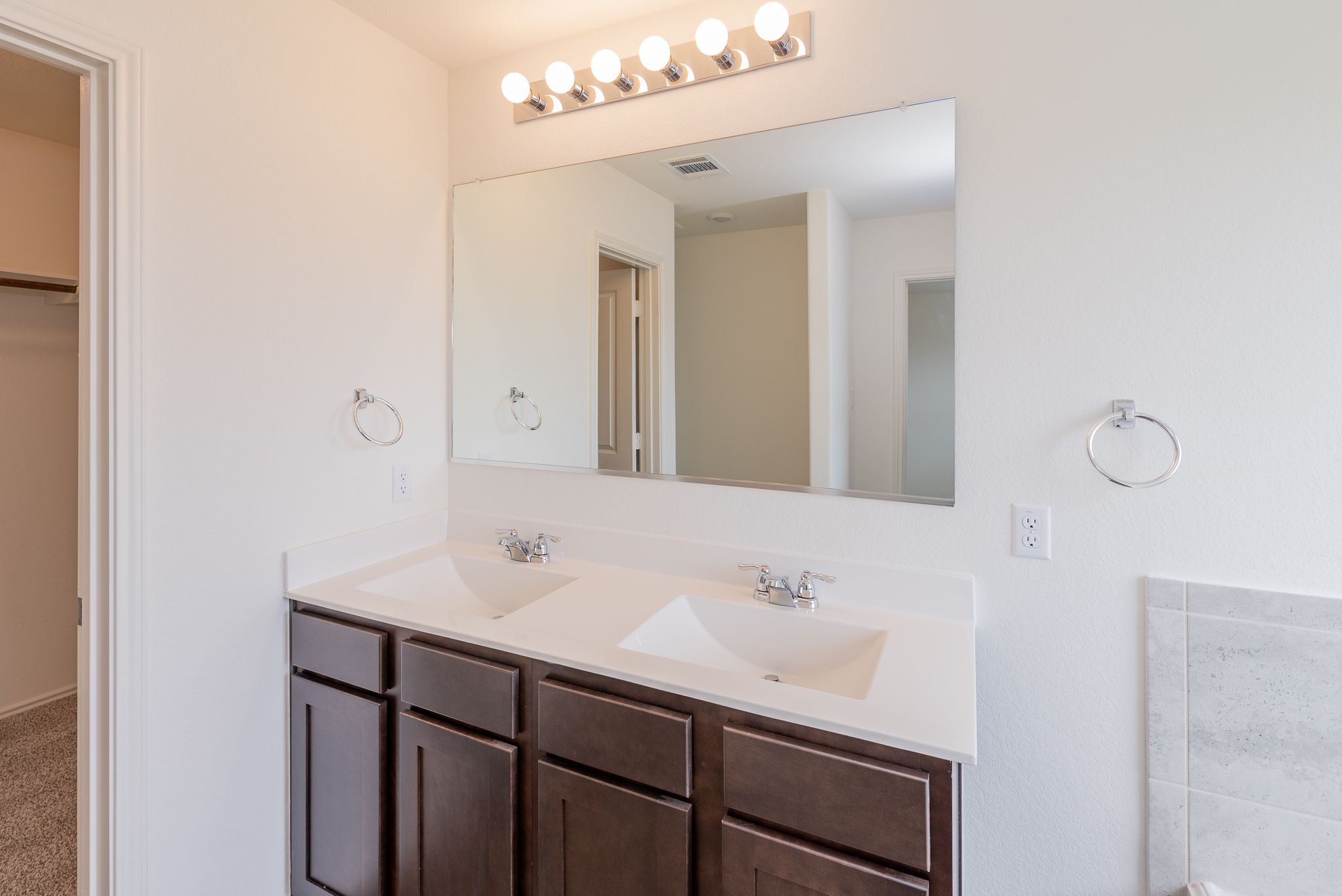 509 Greatest Gift Way Jarrell, TX 76537 - Photo 19 of 28 a bathroom with a sink and a mirror