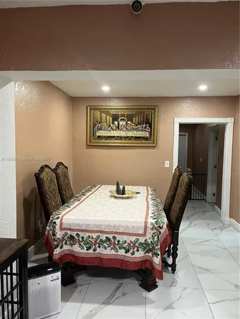 a view of a bedroom with a bed and closet