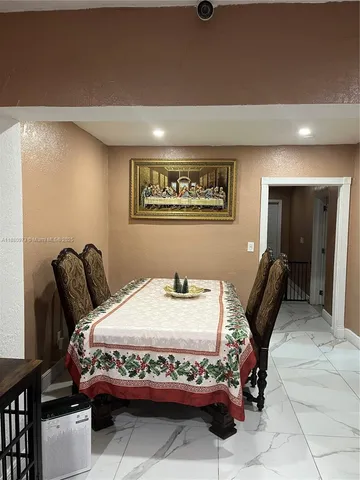 a view of a livingroom with furniture and window