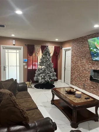 a bedroom with a bed and a night stand