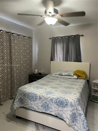 a view of a closet area with living room