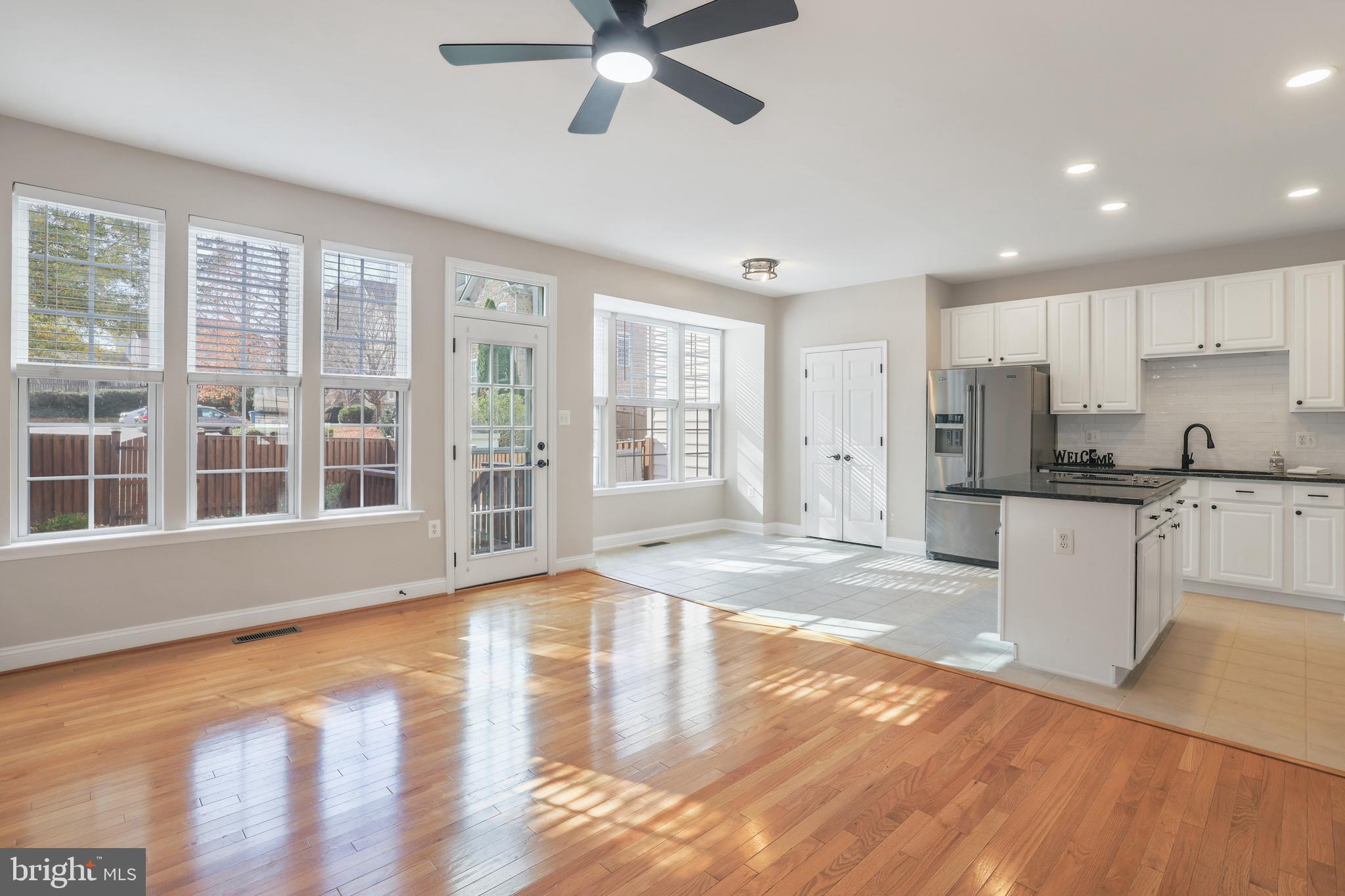 401 Yorkshire Ridge Court Purcellville, VA 20132 - Photo 13 of 64 a view of an empty room with kitchen and window