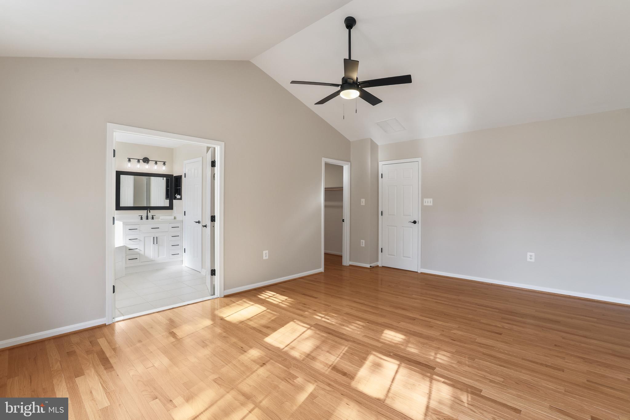 401 Yorkshire Ridge Court Purcellville, VA 20132 - Photo 24 of 64 a view of empty room with wooden floor and ceiling fan