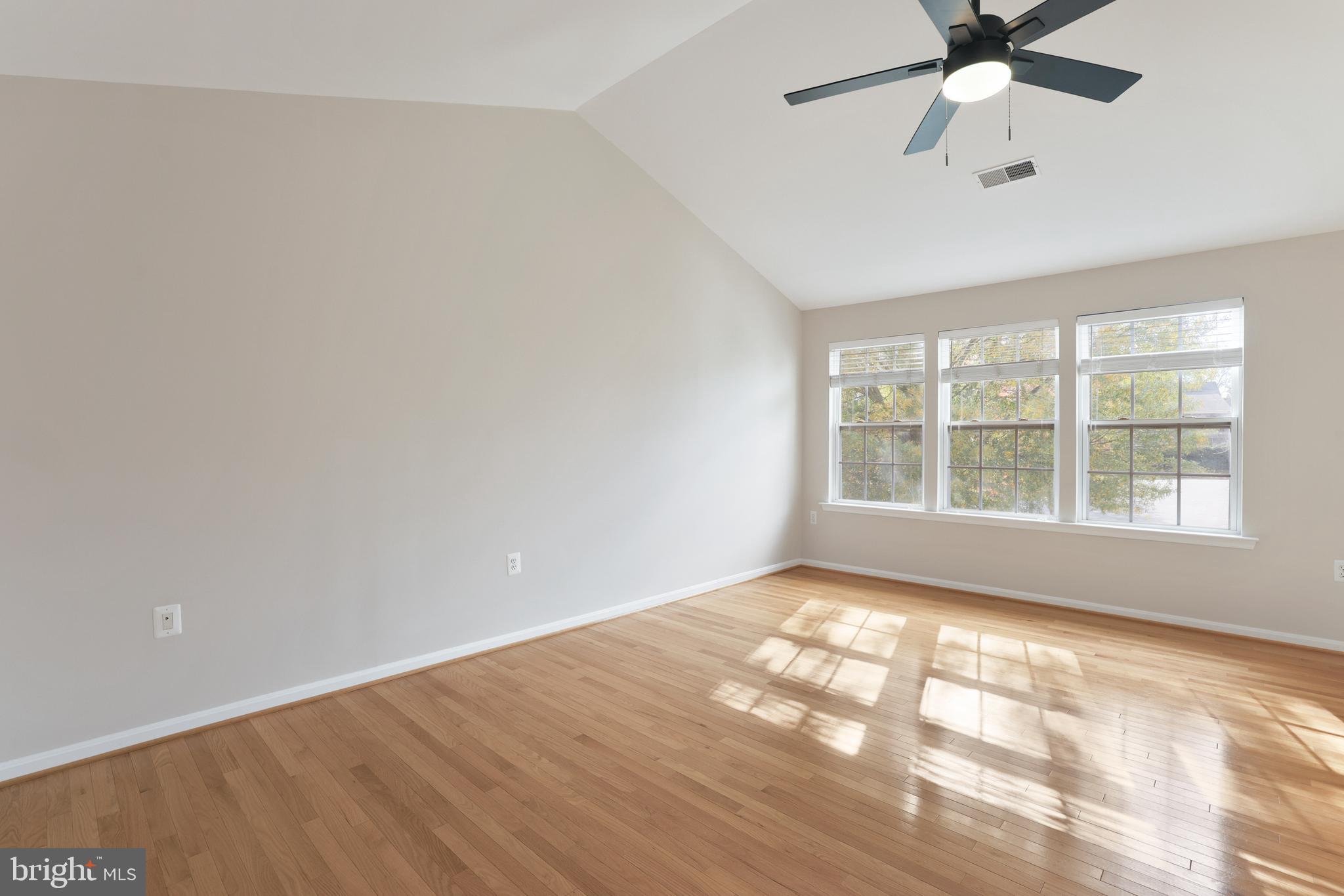 401 Yorkshire Ridge Court Purcellville, VA 20132 - Photo 26 of 64 a view of an empty room with a window and a ceiling fan