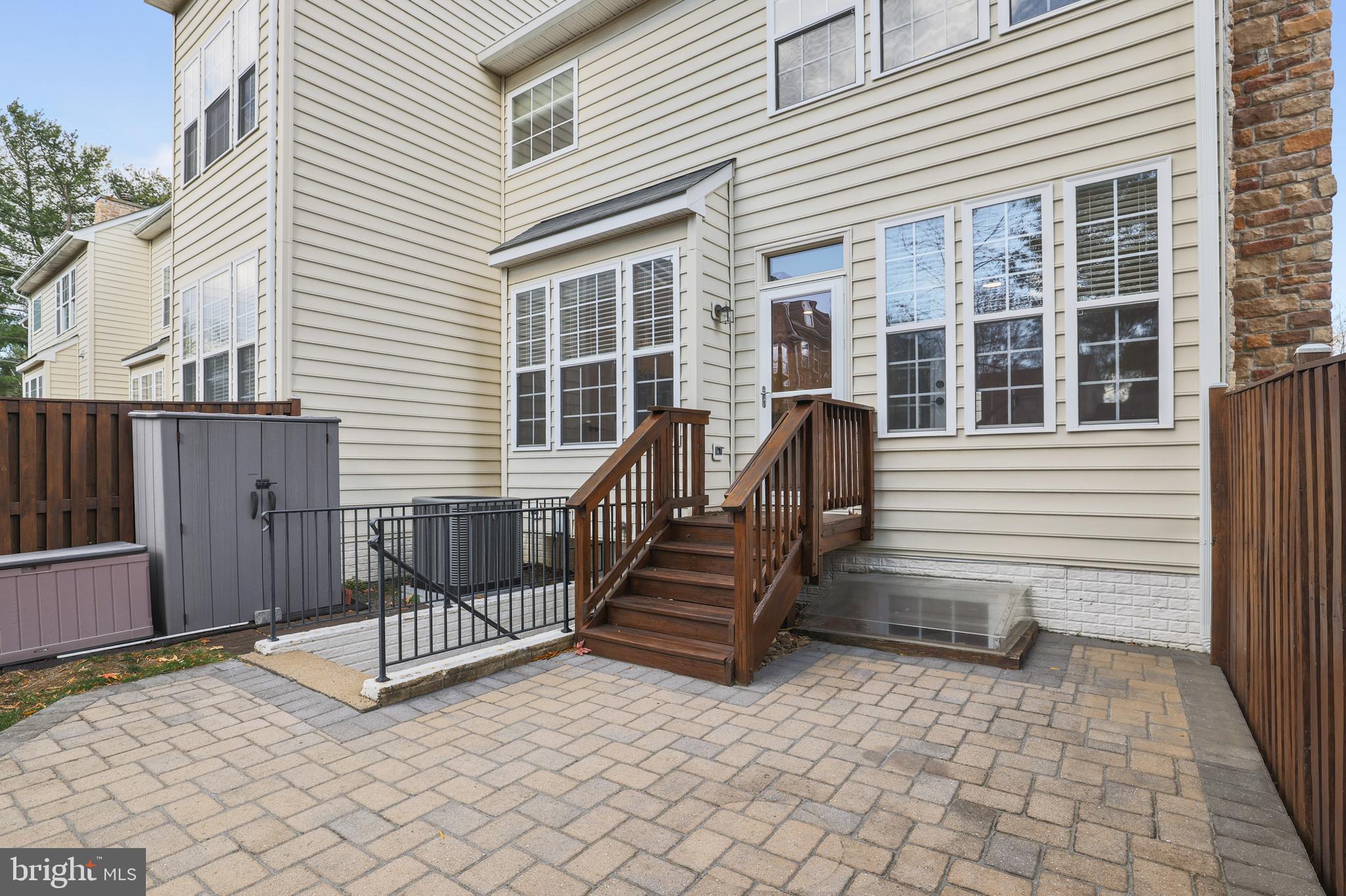 401 Yorkshire Ridge Court Purcellville, VA 20132 - Photo 54 of 64 a view of a house with backyard and a wooden fence