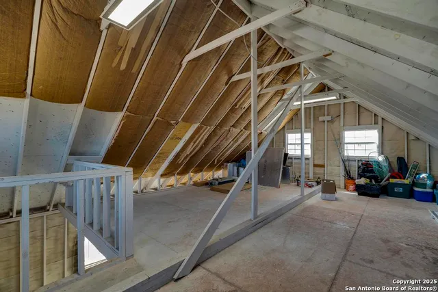 a view of a house with a yard and garage