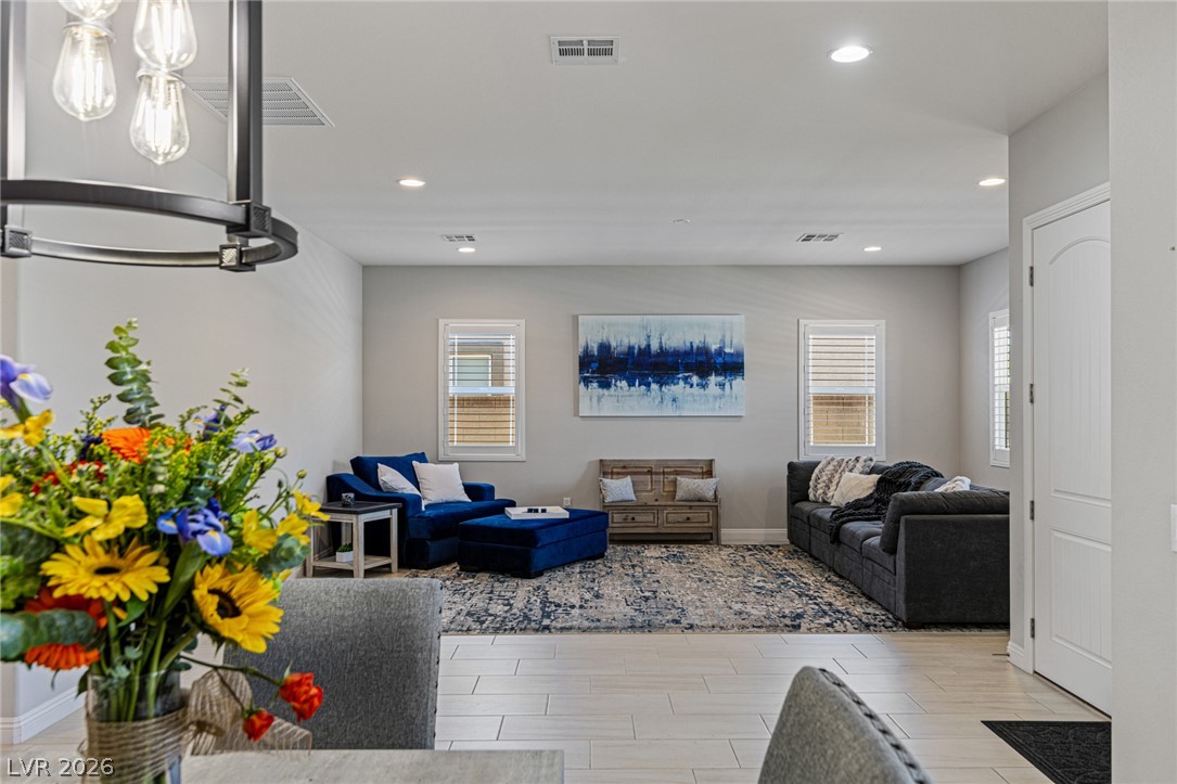 7036 Arabian Ridge Street Las Vegas, NV 89131 - Photo 13 of 64 Front Rooms of the house can be utilized in a variety of different ways to fit your lifestyle.