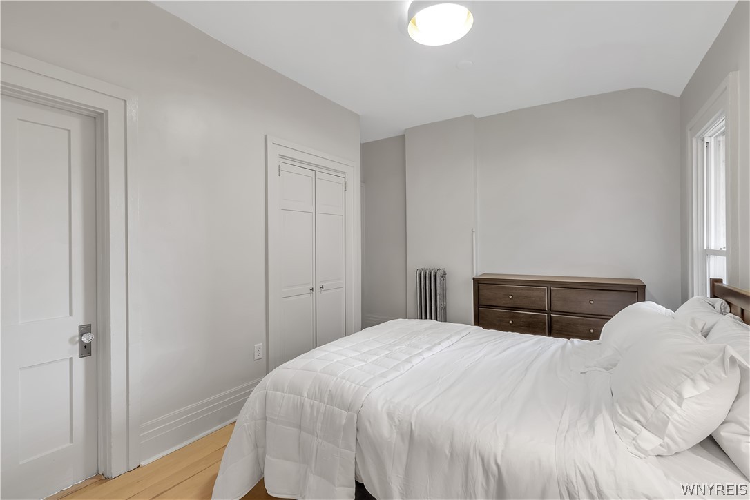 617 Niagara Street, Unit 2 Buffalo, NY 14201 - Photo 13 of 14 Two closets and an ensuite bathroom