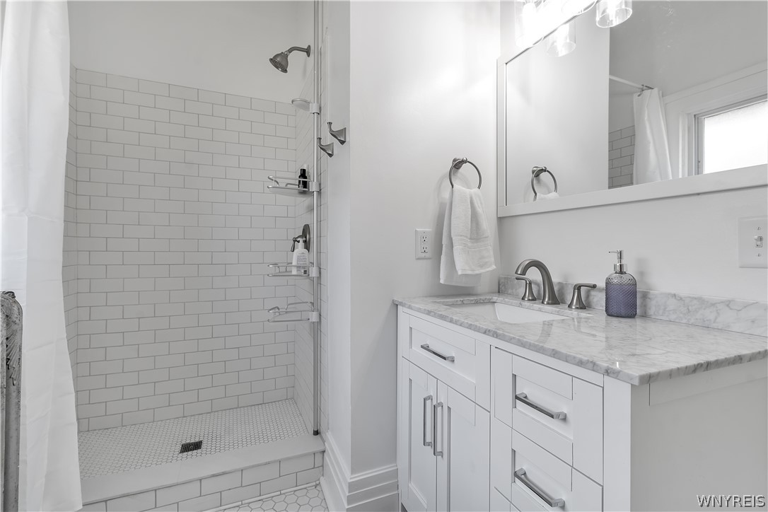 617 Niagara Street, Unit 2 Buffalo, NY 14201 - Photo 3 of 14 Beautiful tiled bathroom