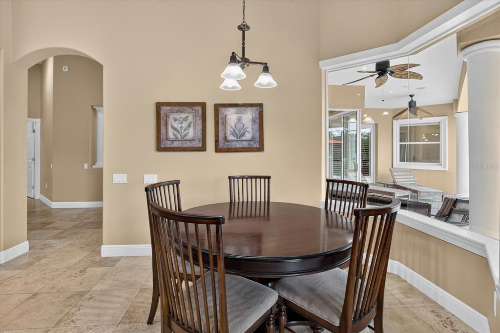 9427 Eddings Road Odessa, FL 33556 - Photo 26 of 93 a view of a dining room with furniture