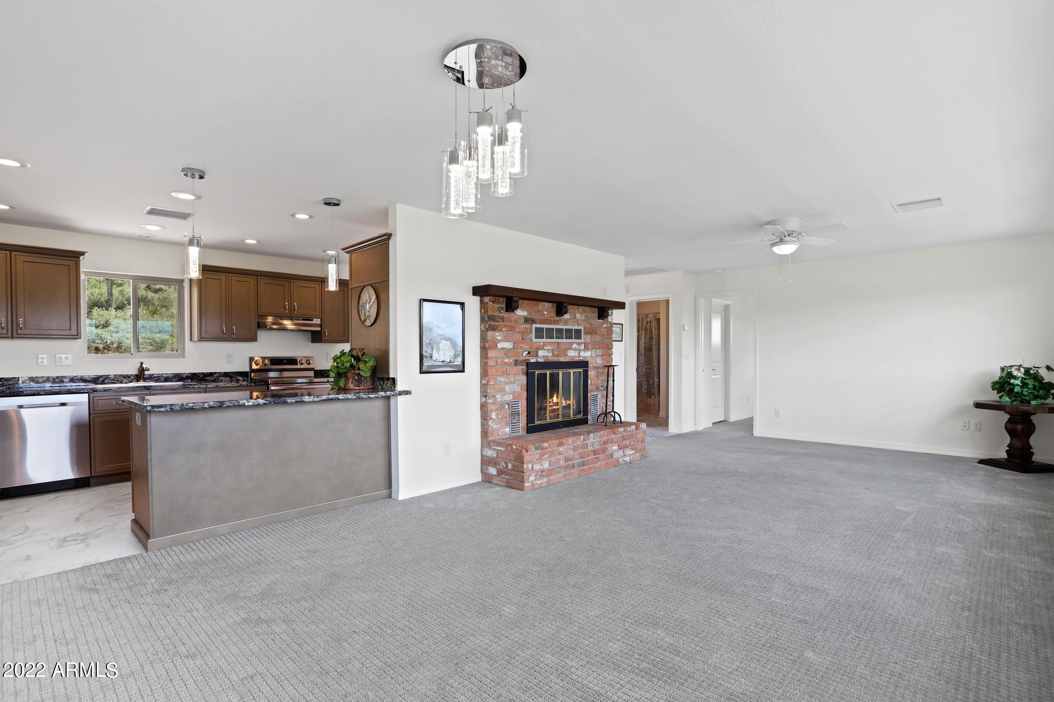 212 East Ridge Lane Payson, AZ 85541 - Photo 13 of 42 212 P12 Living Rm to Kitchen