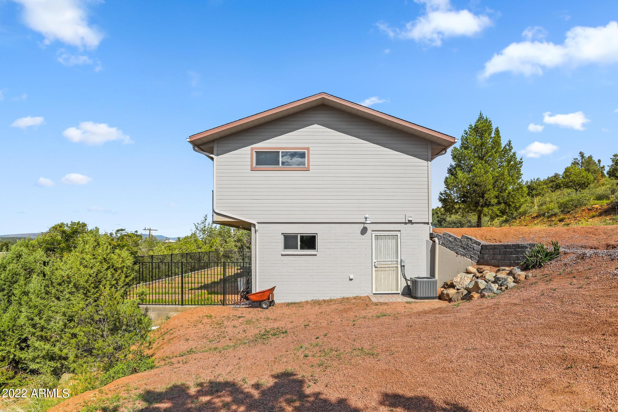 212 East Ridge Lane Payson, AZ 85541 - Photo 5 of 42 212 P4 Side W Side Elevation