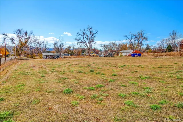 a view of a yard with an umbrella