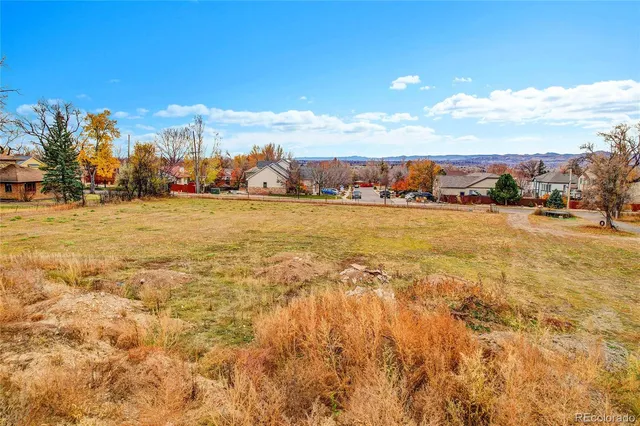 a view of an ocean and city