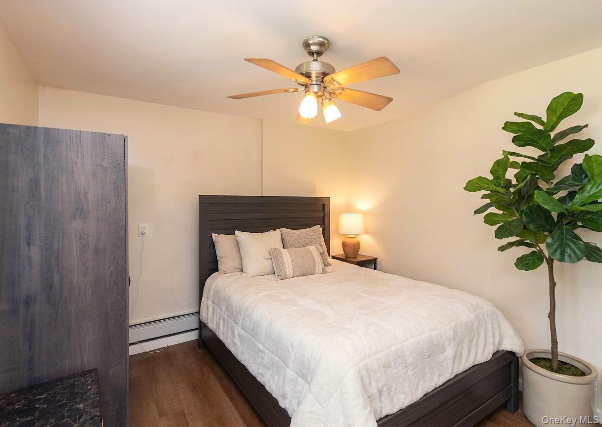 29 Murray Road Middletown, NY 10940 - Photo 16 of 24 a bedroom with a bed and a potted plant