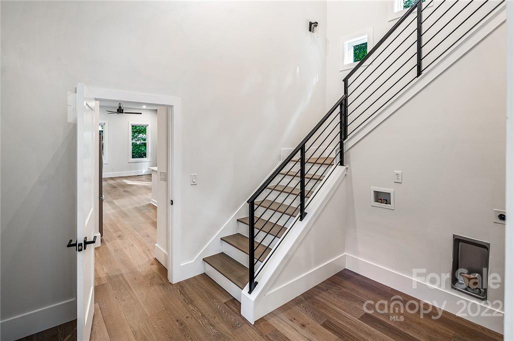 16025 Kiki Court Tega Cay, SC 29708 - Photo 22 of 39 a view of entryway and hall with wooden floor