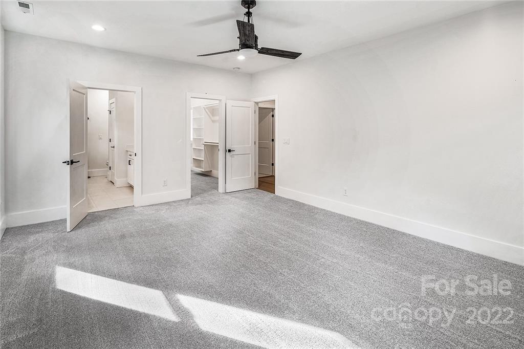 16025 Kiki Court Tega Cay, SC 29708 - Photo 28 of 39 a view of empty room with ceiling fan