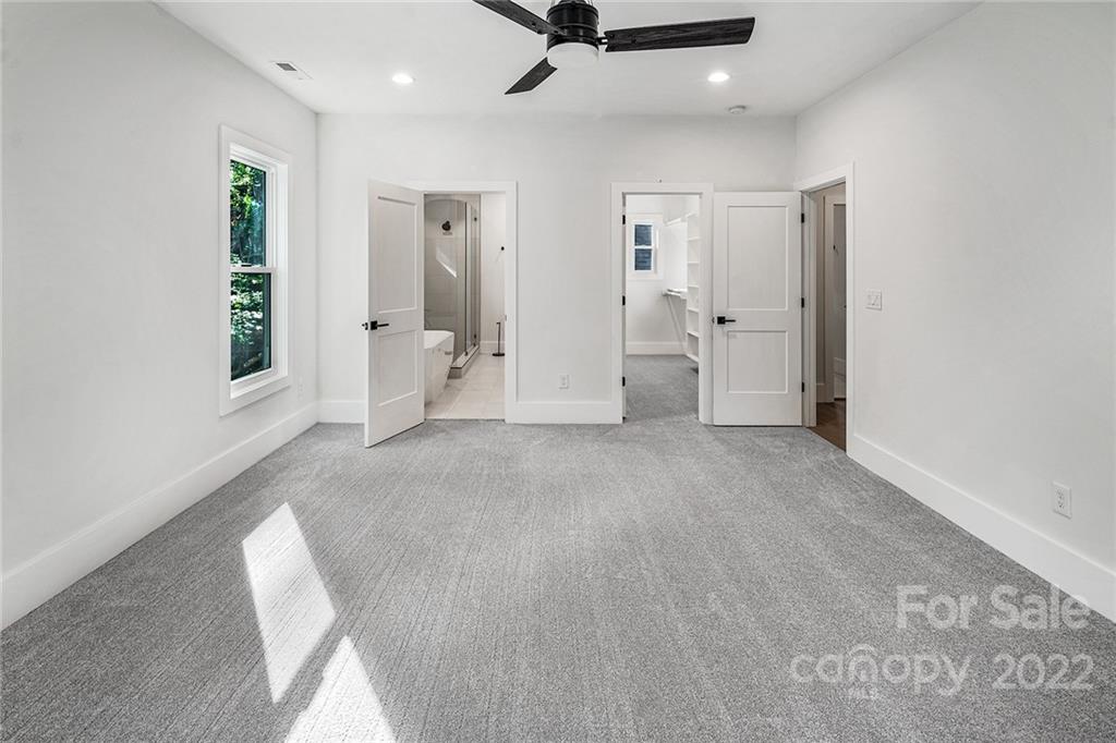 16025 Kiki Court Tega Cay, SC 29708 - Photo 29 of 39 a view of empty room with white walls and window
