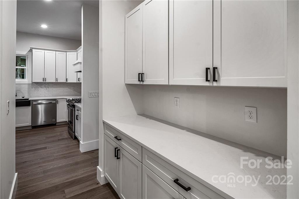 16025 Kiki Court Tega Cay, SC 29708 - Photo 9 of 39 a view of cabinets a sink and dishwasher in a kitchen