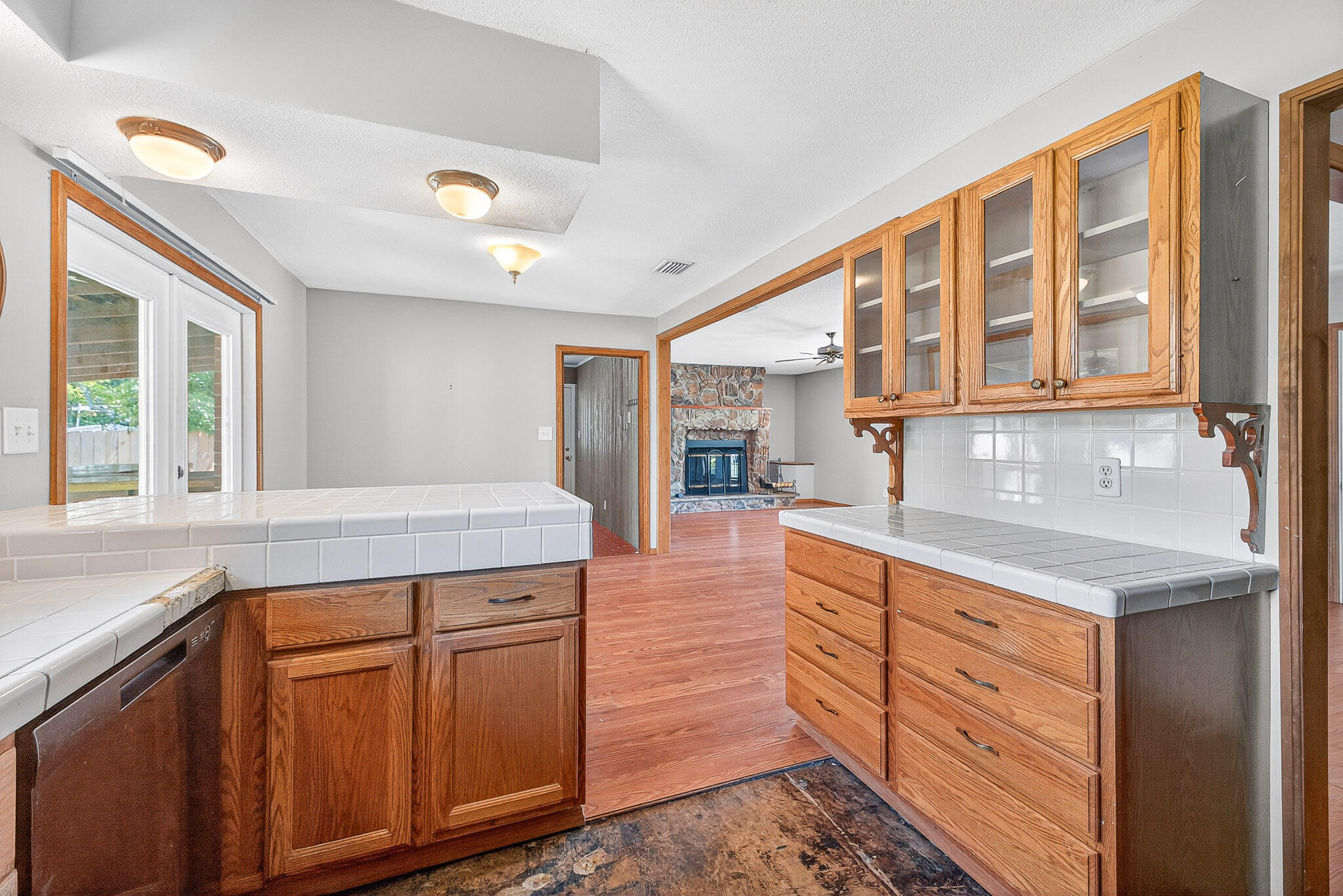 121 Boyce Road Shalimar, FL 32579 - Photo 11 of 34 a kitchen with stainless steel appliances granite countertop a stove and cabinets