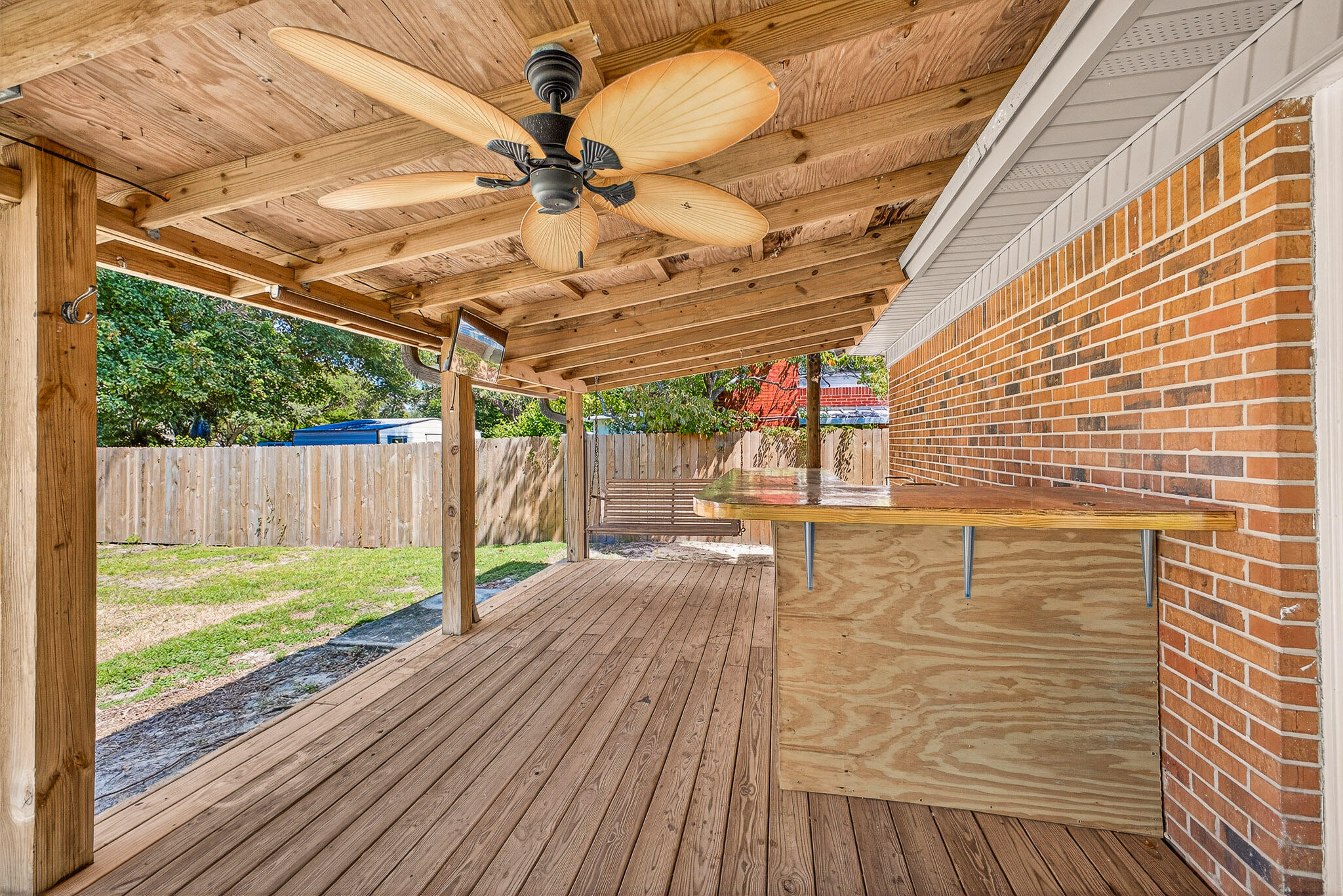 121 Boyce Road Shalimar, FL 32579 - Photo 29 of 34 a view of a backyard with a small cabin