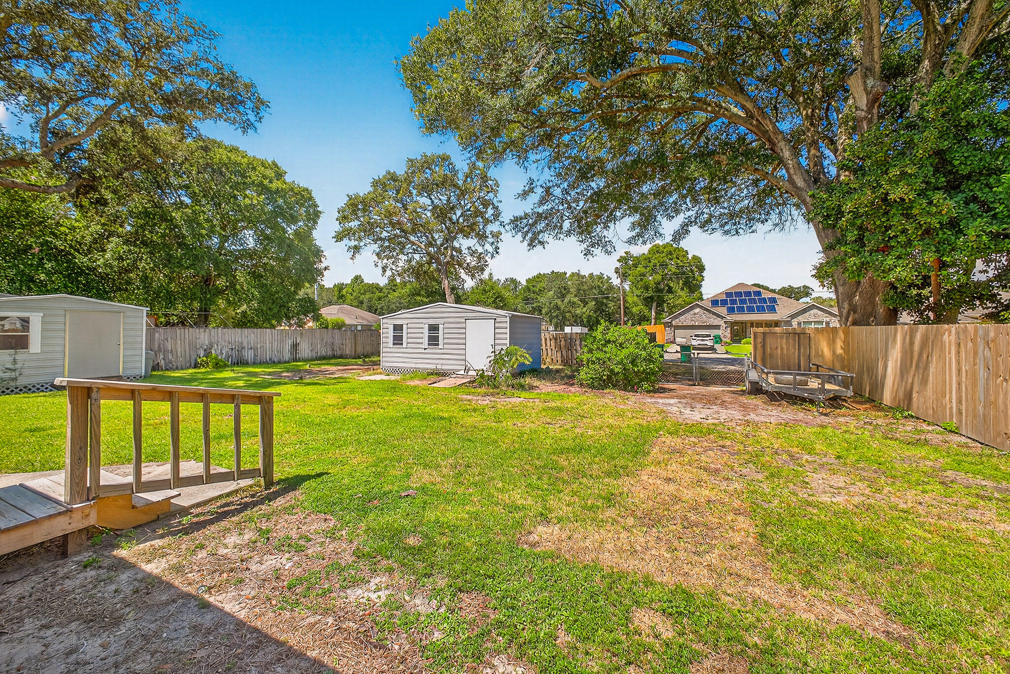 121 Boyce Road Shalimar, FL 32579 - Photo 31 of 34 a view of a swimming pool with a patio