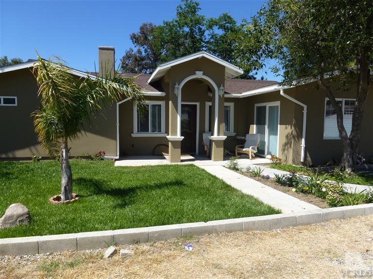 4591 Apricot Road Simi Valley, CA 93063 - Photo 1 of 15 a front view of a house with a yard