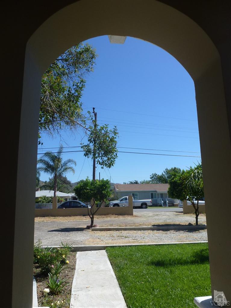 4591 Apricot Road Simi Valley, CA 93063 - Photo 2 of 15 a view of a yard and front view of a house