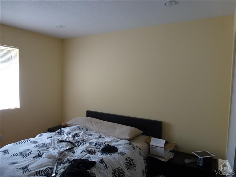 4591 Apricot Road Simi Valley, CA 93063 - Photo 13 of 15 a bedroom with a bed in it