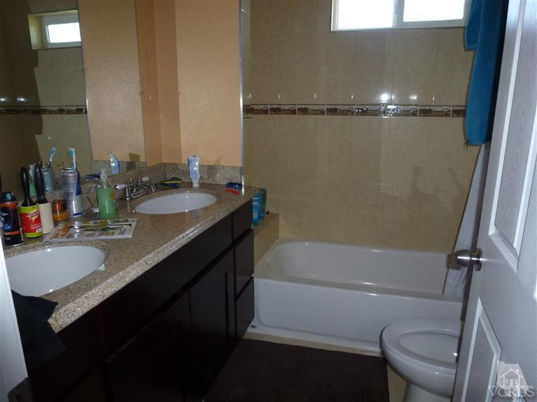 4591 Apricot Road Simi Valley, CA 93063 - Photo 15 of 15 a bathroom with a sink a toilet and shower