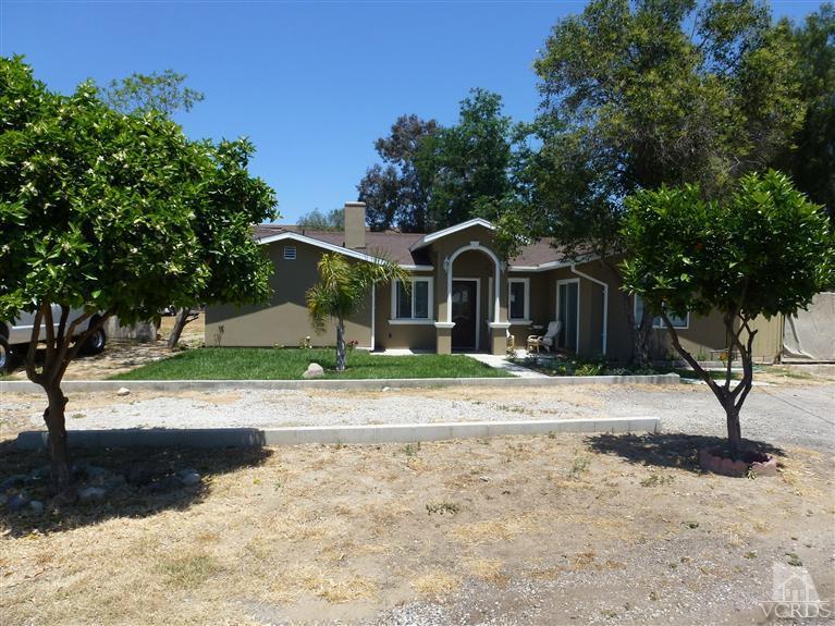 4591 Apricot Road Simi Valley, CA 93063 - Photo 4 of 15 a front view of a house with garden