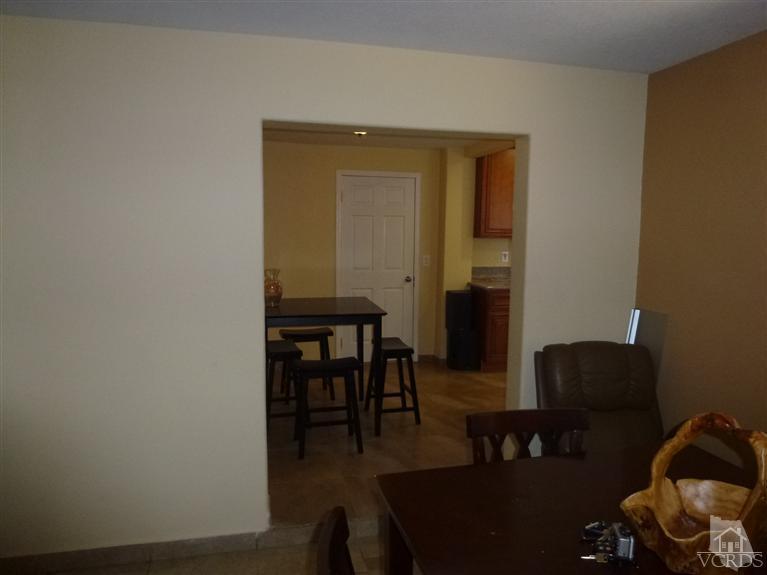 4591 Apricot Road Simi Valley, CA 93063 - Photo 9 of 15 a workspace room with furniture and wooden floor
