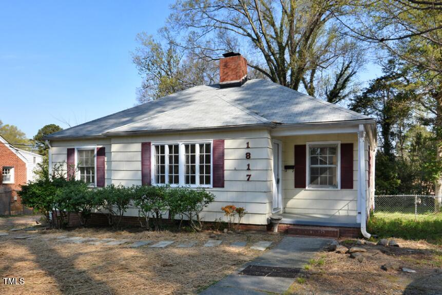 1817 Hillcrest Drive Durham, NC 27705 - Photo 2 of 29 a front view of a house with garden