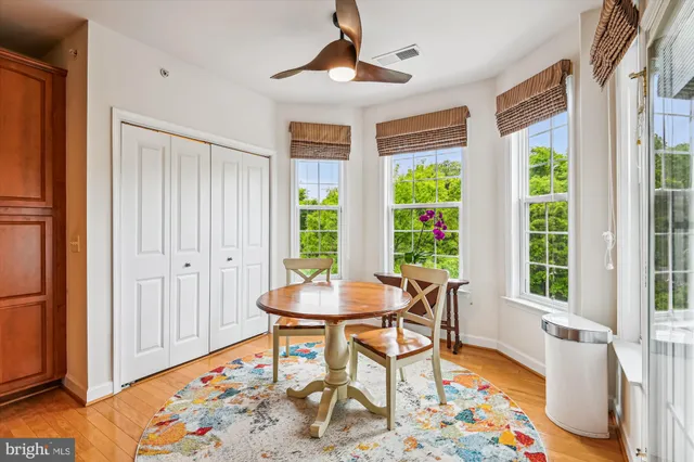 a very nice looking bedroom with a large window