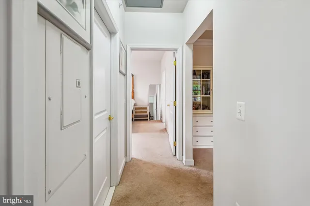 a view of an empty room with a large window
