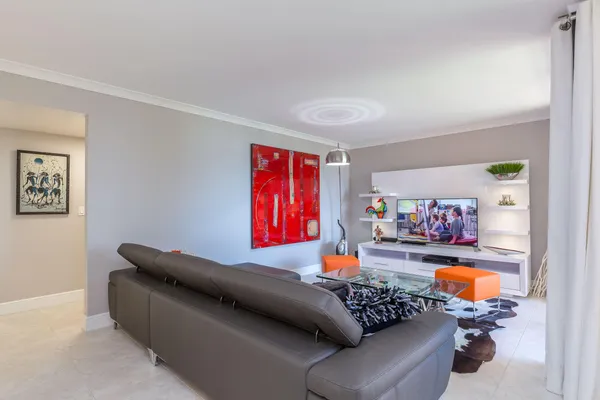 a living room with furniture and a couch