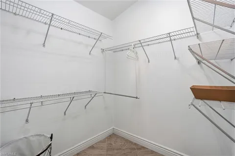 a view of a room with racks on the wall